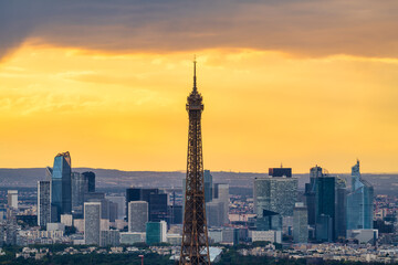 Fototapeta na wymiar Top of Eiffel Tower at sunset in Paris. France