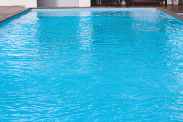 Fototapeta na wymiar Swimming pool with water wave indoor no people background