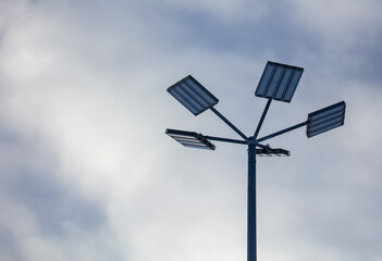 Lantern on a pole against the sky.