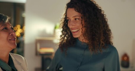 Businesswoman, employee and conversation late at work, strategy and planning in talk, office or business in New York at night. Women, collaboration and advice in discussion in overtime for teamwork