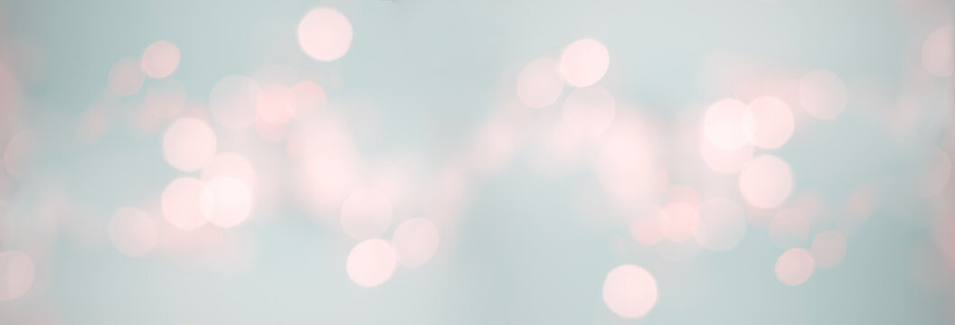 Bokeh background for christmas, defocused round lights in pastel color, flare overlay
