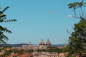 Fototapeta premium Panoramic view on rooftops and domes of Rome, Italy
