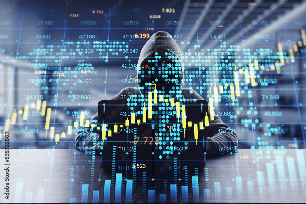 Poster hacker at desktop using laptop with creative forex chart with candlestick graph, index and tech hologram on blurry office interior background. 