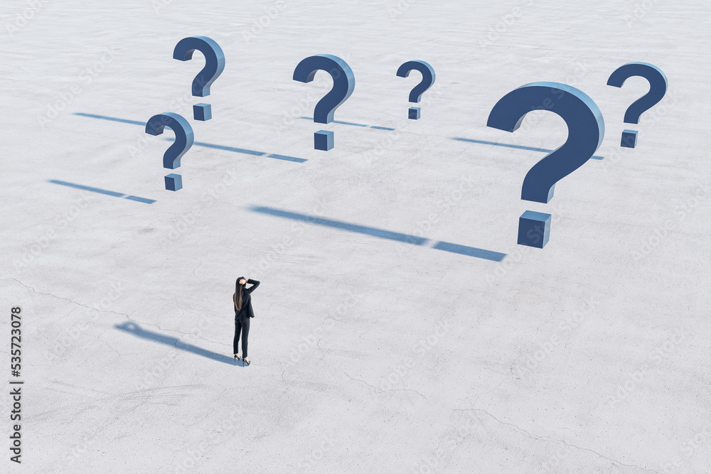 Aufkleber Find solution and right decision concept with confused businesswoman on empty concrete field in front of blue question marks