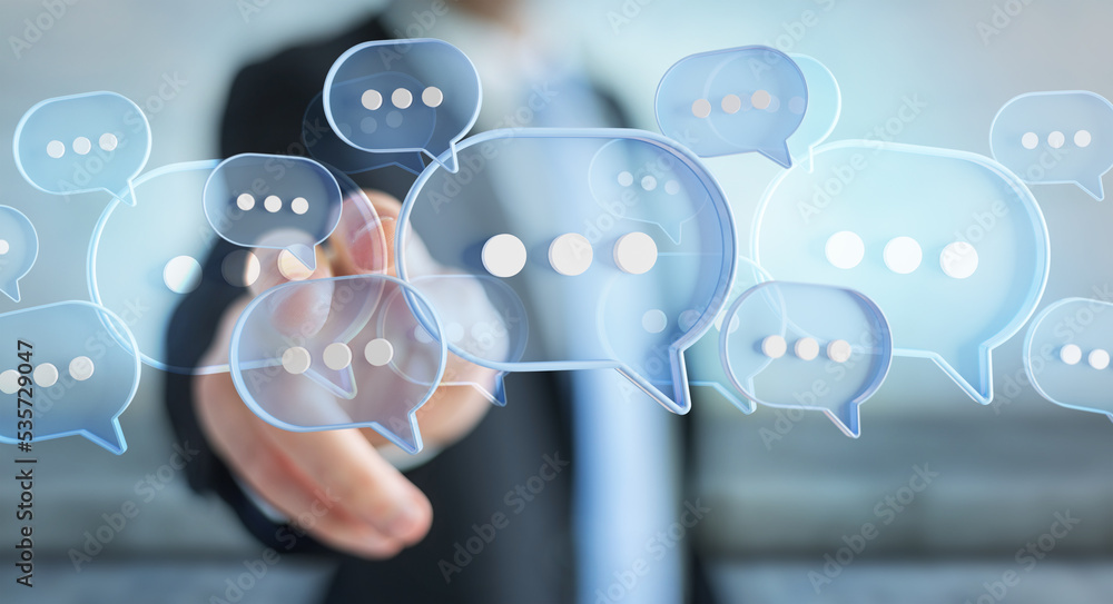 Wall mural man touching with his fingers digital speech bubbles talk icons. minimal conversation or social medi