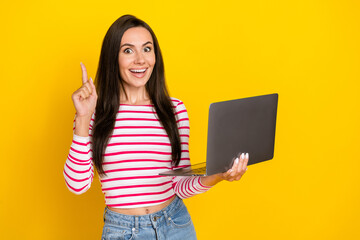 Portrait photo of young attractive smart woman finger up have genius idea hold laptop coder...