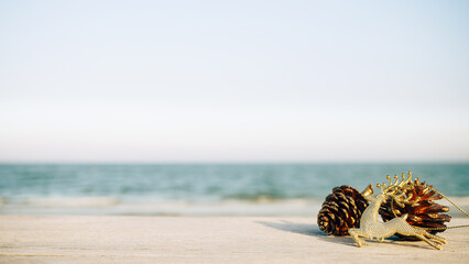 Christmas decorations on the beach, holiday and vacation concept