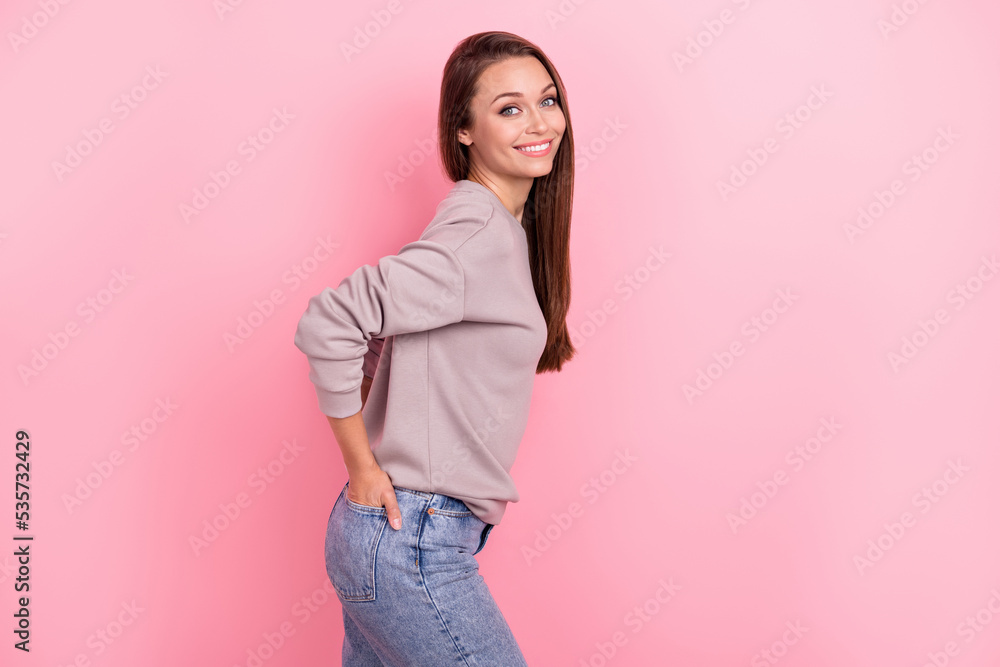 Sticker Profile portrait of satisfied glad lady put hands pockets beaming smile isolated on pink color background