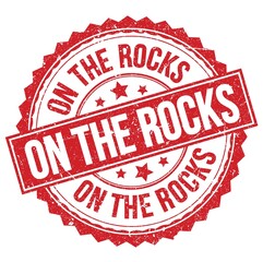 ON THE ROCKS text on red round stamp sign
