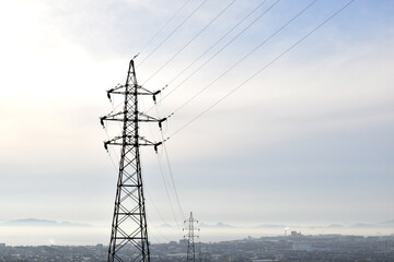 A transmission tower that sends electricity to a distant city