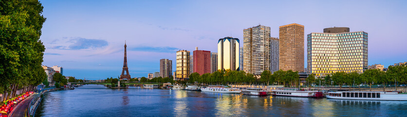 Sunset skyline panorama of Beaugrenelle district of Paris with Eiffel Tower in the background. France
