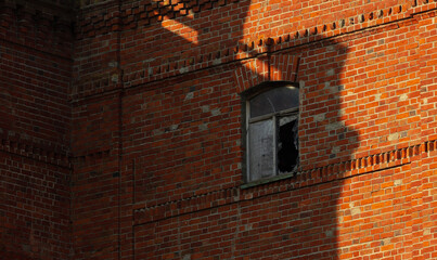 old brick wall with windows