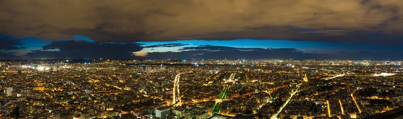Naklejka premium Aerial panorama of Paris at dusk, France