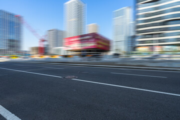 empty asphalt road with city skyline background in china