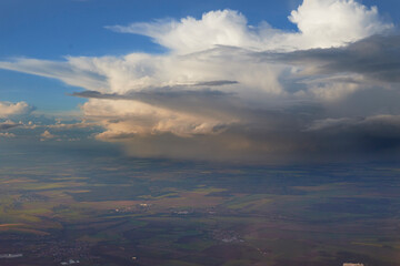Fototapeta premium A massive and very local bad weather system with heavy rain taken from an airplane