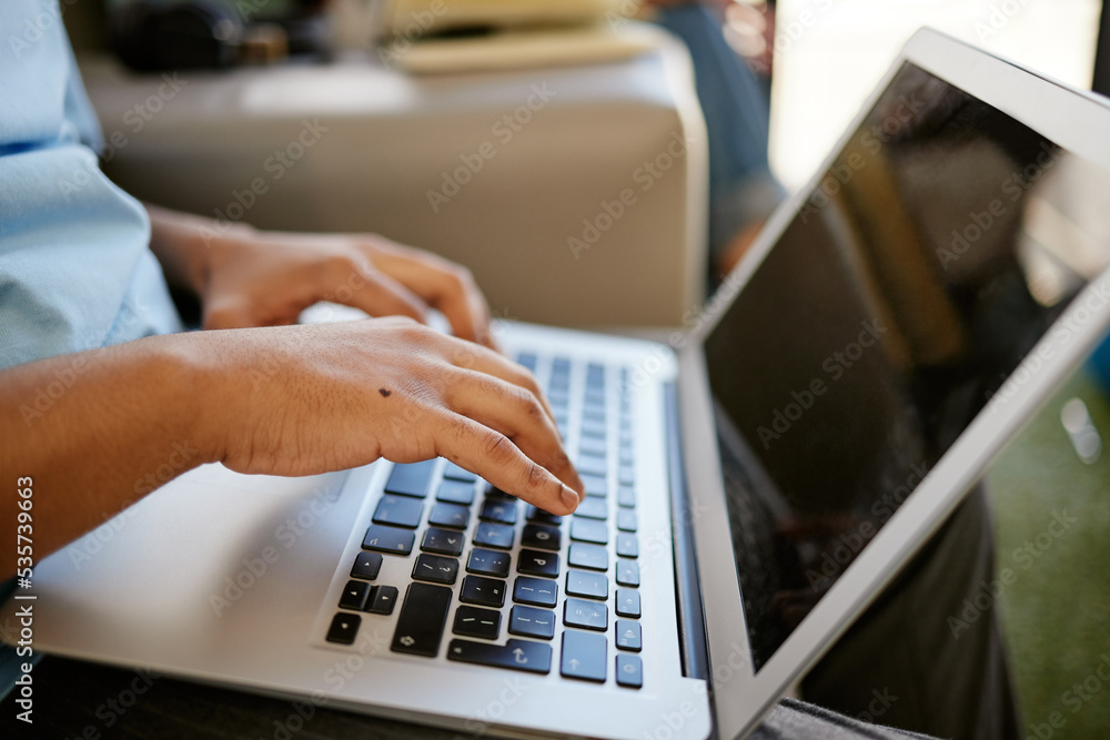 Poster hands typing on laptop, sitting on sofa at university and studying online. student on social media, 