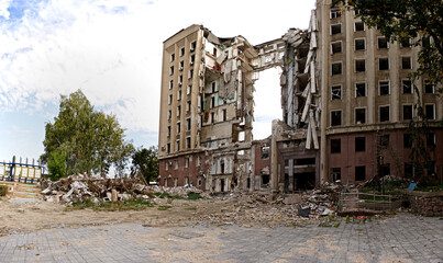 the consequences of the Russian shelling of the city of Mykolaiv, destroyed houses, damaged cars