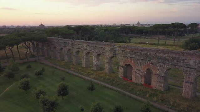 Tourist enjoys view atop section of ancient Roman Claudio Aqueduct