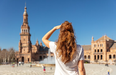 Fototapeta premium Traveler woman tourist at Seville looking at Plaza de Espagna