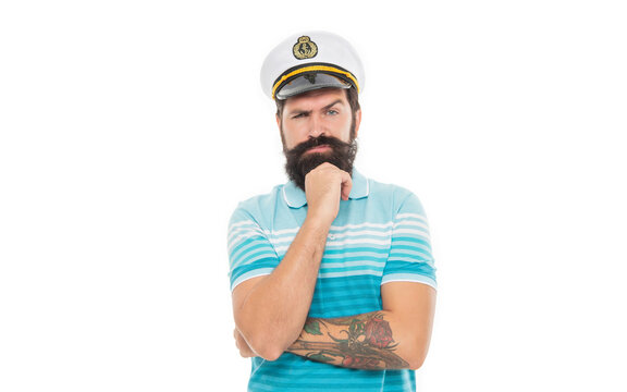 Thoughtful man wearing captain hat. Bearded man thinking isolated on white. Man sailor with beard and moustache