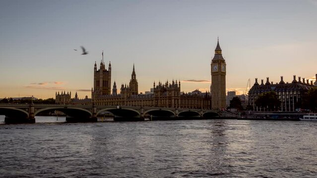 Day to night time lapse view of the Westminster Bridge and Palace with the fresh renovated Big Ben clocktower in London, England