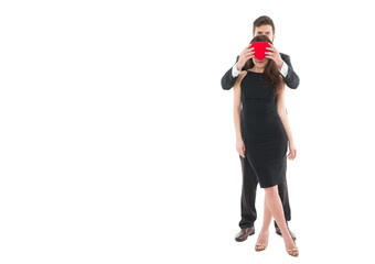 Blind love and manipulations. Man formal suit and attractive woman. Love and romance. Romantic holiday. Man hold valentines heart. Happy guy with red heart. Blind love victim. Completely in love