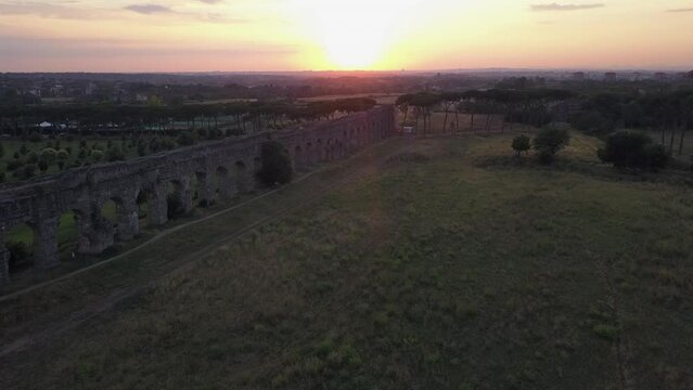 Ruin of Claudio Aqua Anio Vetus aqueduct stands in Roman park, Rome