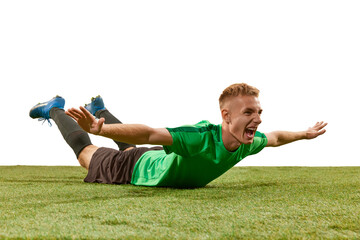 Celebrating goal. Excited football player shouting, expressing win emotions isolated over white...