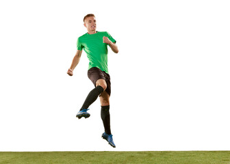 One young man, professional soccer football player jumping isolated on white studio background. Concept of action, energy, sport.