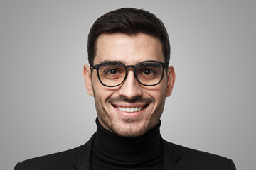 Close up portrait of art director or artist on grey background