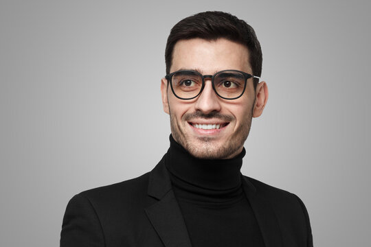 Close up portrait of fashion buyer or male stylist on grey background