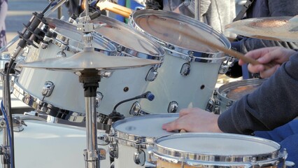 Closeup shot of drum instrument while a drummer using it