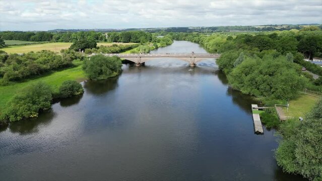 Beautiful vertical shot of the River Trent in Nottinghamshire with the Gunthorpe Bridge over it