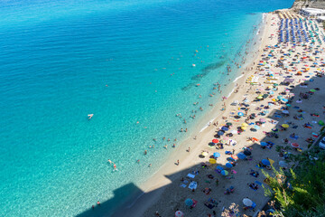 Tropea beach along the Tyrrhenian Sea Coast of Gods (Costa degli Dei). Tropea beautiful seaside resort city of Calabria, southern Italy. - obrazy, fototapety, plakaty