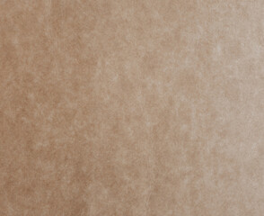 Vintage brown craft paper texture, horizontal top view. Abstract paper background close up.