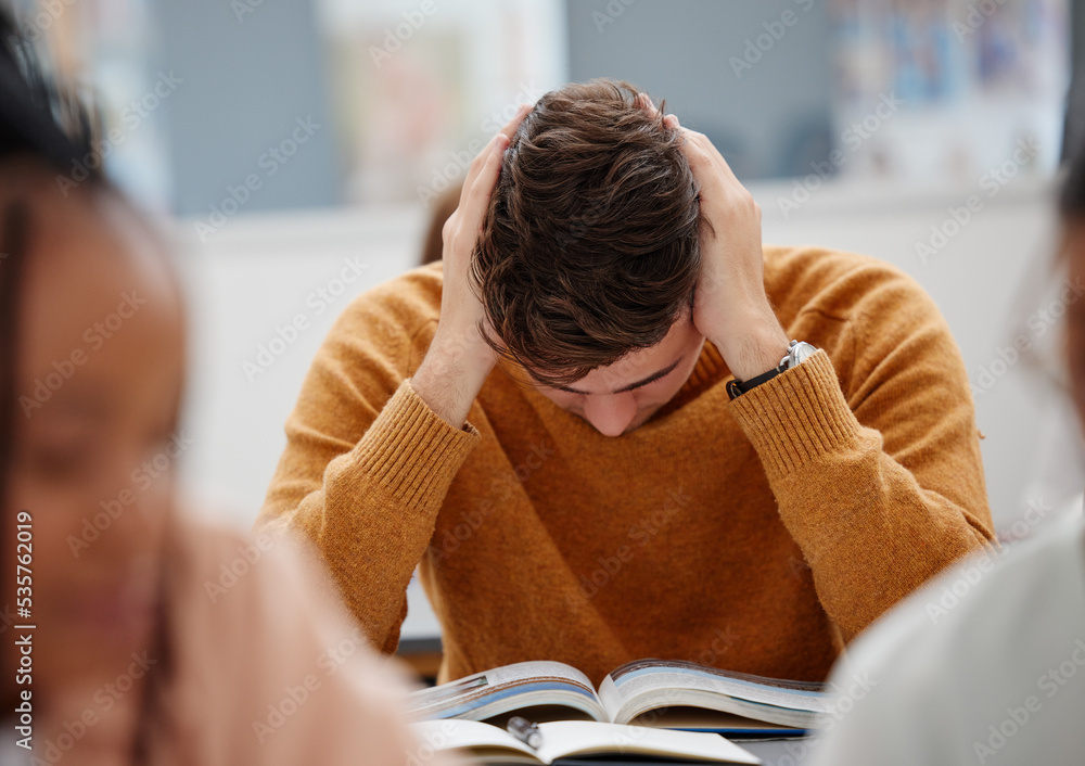 Poster University, study and tired student reading book in class while studying for test or exam. Education, stress and burnout man with headache, knowledge and scholarship learning college work in library.