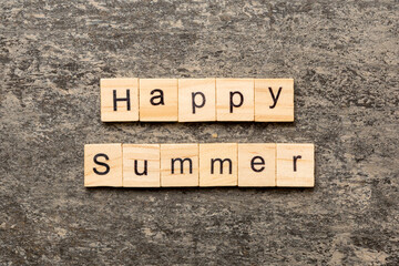 Fototapeta premium Happy Summer word written on wood block. Happy Summer text on cement table for your desing, concept
