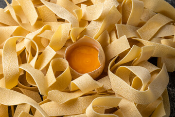 Homemade egg noodles, close up view of food products