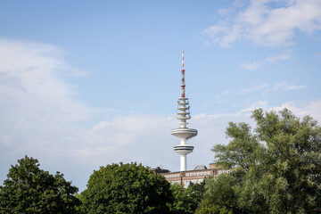 The TV tower Heinrich-Hertz-Turm visible above the park Planten un Blumen in Hamburg Germany