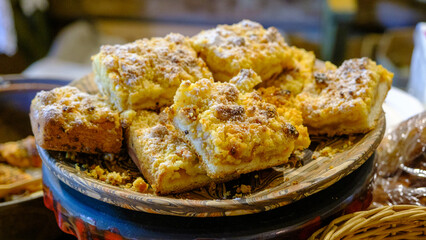 Lots of crumbled cake on the side plate. Home-baked delicacies