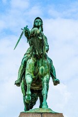 Fototapeta premium Equestrian statue of Joan of Arc (Jeanne d'Arc) in Orleans, France; bronze outdoor monument