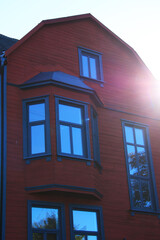 Fototapeta na wymiar old red wooden house