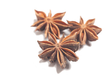 Star anises isolated on white background. Dried star anise spice fruits