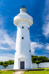 Close-up of white Eluanbi Lighthouse with the blue sky background