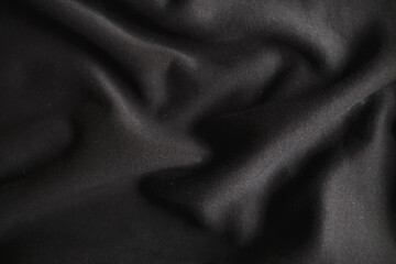 black wrinkled plush fabric background texture, soft material pattern