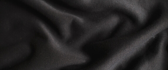Fototapeta premium black wrinkled plush fabric background texture, soft material pattern. banner