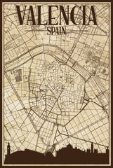 Brown vintage hand-drawn printout streets network map of the downtown VALENCIA, SPAIN with brown city skyline and lettering