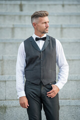 elegant man in bowtie. grizzled man in formalwear. tux man bridegroom