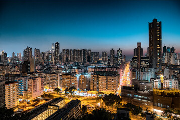 View of Kowloon skyline after sunset from the Garden hill, Hong Kong - obrazy, fototapety, plakaty
