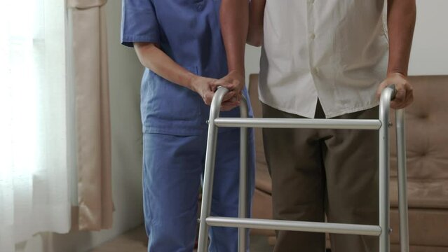 Caregiver takecare older man that having Sarcopenia or muscle loss. Sarcopenia is a degenerative disease of the muscle usually caused by the natural consequence of aging.